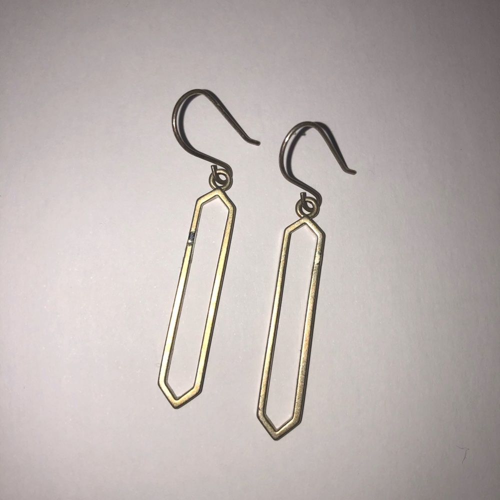 Long diamond earrings in gold